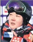 ?? ?? Ning Qin speaks to reporters after winning gold at the 2016 National Winter Games.