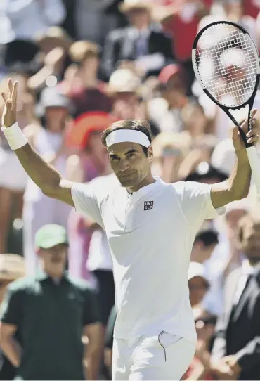  ?? PICTURE: CLIVE BRUNSKILL/GETTY ?? 0 Roger Federer celebrates his straight sets win over Dusan Lajovic.