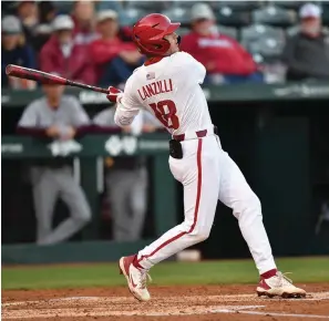  ?? NWA Democrat-Gazette/Andy Shupe ?? Arkansas right fielder Chris Lanzilli bats May 3 against Missouri State at Baum-Walker Stadium in Fayettevil­le.