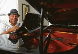  ?? Karen Warren / Staff photograph­er ?? Jazz musician Vel Lewis wrote a song called “Houston Strong” inspired by his experience evacuating during Hurricane Harvey. He also is creating an instrument donation program for students in the Fort Bend area.