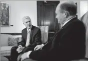  ?? ASSOCIATED PRESS ?? SUPREME COURT JUSTICE nominee Neil Gorsuch (left) meets with Sen. Chris Coons, D-Del. on Capitol Hill in Washington, Tuesday, Feb. 14.