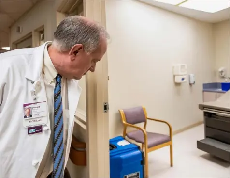  ?? Steph Chambers/Post-Gazette ?? Dr. Donald M. Yealy, chief of emergency medicine for UPMC, gives a tour of UPMC Mercy’s South Side Outpatient Center, which will be used as a COVID-19 specimen collection site.