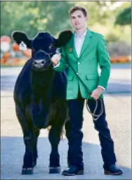  ?? SUBMITTED ?? Ayden Jowers poses with his steer which won Grand Champion Pasture to Plate steer honors at the Benton County Fair. Ayden is a member of the Gravette Gleamers 4-H Club.