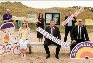  ??  ?? (Back, from left) Billy Byrne from Wexford County Council; Aileen Dowling from Failte Ireland; Liz Hore from the county council; Cllr Ger Carthy, Chairperso­n of Wexford County Council; Cllr Michael Whelan Chairpersn of the New Ross Municipal District; and Colm Neville, Chairperso­n of Visit Wexford, at the launch of the new Visit Wexford campaign on Curracloe beach.