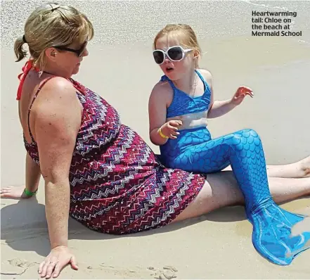  ??  ?? Heartwarmi­ng tail: Chloe on the beach at Mermaid School