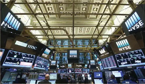  ?? (Stephen Yang/Reuters) ?? TRADERS WORK on the floor of the New York Stock Exchange last Friday. US stocks are owned with a near-record level of borrowed funds, often the quickest money to leave at the earliest signs of weakness.