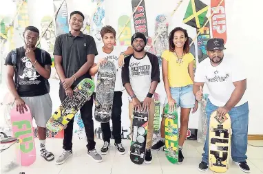  ??  ?? Members of the Jamaican skateboard team, Shreddaz, along with CEO of Skateboard Palace Steve Douglas (right).