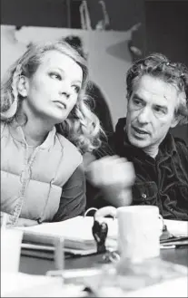  ??  ?? THE DIRECTOR chats with his wife and frequent leading lady, Gena Rowlands, during theatrical phase of his career.