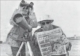  ?? PHOTO BY LYNN BILLARD ?? Appearing on the front page of the St. Thomas Times-Journal, this 1993 photo of Thomas Froese with colleague Marg Berry illustrate­s that newspaper’s hunt for the elusive Lake Erie Monster.