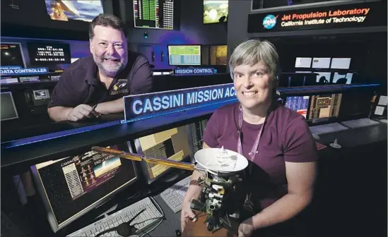  ?? Al Seib Los Angeles Times ?? TODD BARBER, left, Cassini’s lead propulsion engineer, and Jo Pitesky, a mission planner, both found themselves increasing­ly distraught as the orbiter’s end neared.