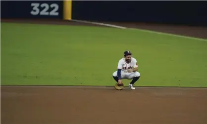  ?? Photograph: Gregory Bull/AP ?? Houston Astros second baseman José Altuve reacts after a missed throw to second during the sixth inning of Tuesday’s Game 3 of the American League Championsh­ip Series against the Tampa Bay Rays.