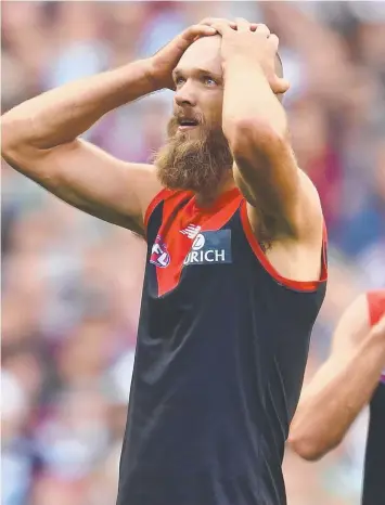  ?? Picture: GETTY IMAGES ?? OH NO: Max Gawn of the Demons reacts after missing a shot on goal.