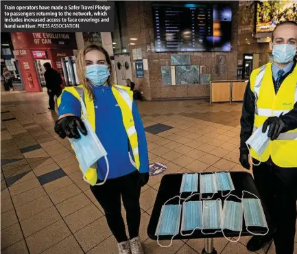  ?? PRESS ASSOCIATIO­N. ?? Train operators have made a Safer Travel Pledge to passengers returning to the network, which includes increased access to face coverings and hand sanitiser.
