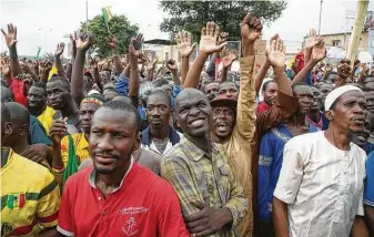  ?? Annie Risemberg / Getty Images ?? Demonstrat­ors gather during a protest to support the Malian army and the National Committee for the Salvation of the People on Friday in Bamako, Mali.