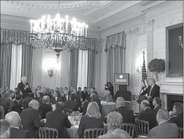 ?? Special to the Democrat-Gazette/THE WHITE HOUSE ?? Gov. Asa Hutchinson, (standing left), speaks with President Donald Trump during a meeting with governors Monday. Hutchinson said afterward he was “impressed with the president’s commitment to find solutions” that would prevent another mass shooting,...