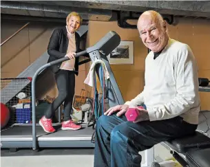  ?? BARRY GRAY THE HAMILTON SPECTATOR ?? Miriam and Ron Davidson, long-time clients of Ernie Schramayr, keep fit with exercise equipment in their basement.