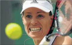  ?? Picture: AFP ?? DESPERATE: Angelique Kerber feels she is still on the right track in spite of losing to Garbine Muguruza in the fourth round match of the Wimbledon yesterday