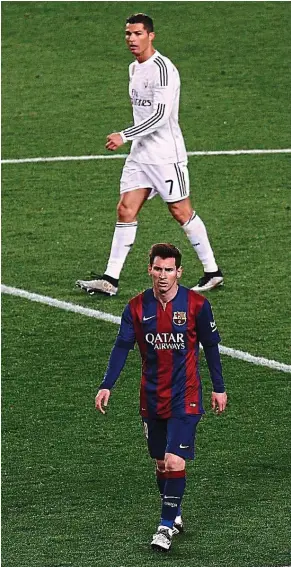  ??  ?? Real Madrid’s Ronaldo (top) takes a 36-32 goal lead ahead of Barcelona’s Lionel Messi. — AFP