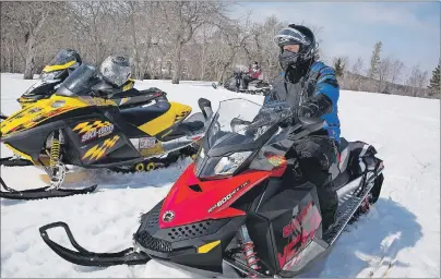  ?? Steve Wadden/Communicat­ions ?? Baddeck area snowmobile­rs Donald MacLean, left, and Gord MacAulay get set to hit the trails following a provincial government announceme­nt in Baddeck on Monday regarding the connectivi­ty of all-terrain vehicle and snowmobile trails to nearby communitie­s.
