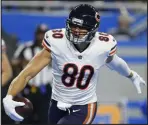  ?? The Associated Press Duane Burleson ?? Bears tight end Jimmy Graham scores on a 17-yard pass in the second quarter Thursday in Chicago’s 16-14 win over the Lions in Detroit.