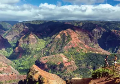  ??  ?? ABOVE: Waimea Canyon on the island of Kauai is known as the “Grand Canyon of the Pacific.” BELOW: Zip lining tours operate on the Big Island and Kauai. BOTTOM: On Kauai, tube down old sugar plantation irrigation canals and through tunnels hand-dug in the 1870s. IHVB