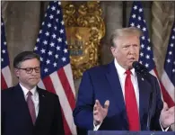  ?? (AP/Wilfredo Lee) ?? Republican presidenti­al candidate former President Donald Trump talks as Speaker of the House Mike Johnson, R-La., listens during a news conference at Mar-a-Lago in Palm Beach, Fla., on Friday.