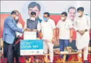  ?? ANI ?? Union health minister Mansukh Mandaviya releases the first commercial batch of Covaxin, at Ankaleshwa­r on Sunday.