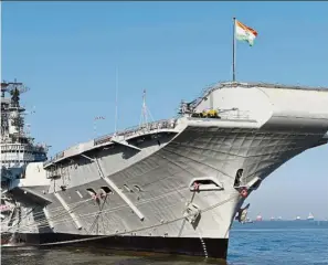  ?? — AFP ?? India: The ‘INS Viraat’ docking on its final day of service in Mumbai on March 6, this year.