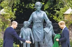  ?? Dominic Lipinski Associated Press ?? A STATUE of Diana, princess of Wales, is unveiled in London in 2021.