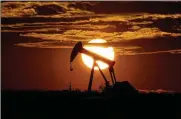  ?? ERIC GAY / AP ?? Some analysts expect that when OPEC meets next month, they will allow more production, which could drive down prices. But for now, petroleum stockpiles are dwindling as energy demand begins to recover.