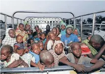  ?? Photo: REUTERS ?? Women and children rescued from Boko Haram arrive at a refugee camp in Nigeria.