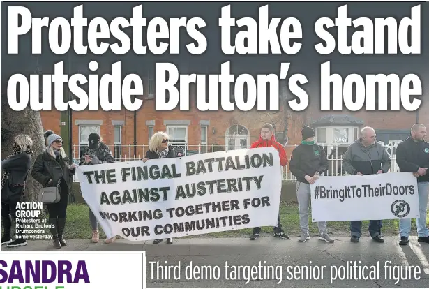  ??  ?? ACTION GROUP Protesters at Richard Bruton’s Drumcondra home yesterday