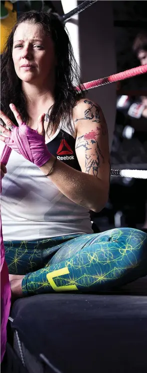  ??  ?? Gloves are off: fighting Scot Joanne Calderwood has confounded her teachers with her ascent to the top in UFC