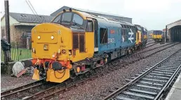  ?? Nick Calzolari ?? Despite poor seasonal weather, the Bo’ness and Kinneil Railway diesel event on December 29 proved popular. The main highlight of the event was the return to service of 37403 Isle of Mull, along with what is thought to be the final working appearance of 37703 on the line following its recent sale. The two Class 37s are pictured at Bo’ness during the event.