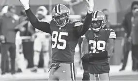  ?? KEN BLAZE/USA TODAY SPORTS ?? Browns defensive end Myles Garrett (95) riles up the crowd during the second half against the Colts on Oct. 11.