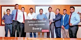  ??  ?? From Left Singer Sri Lanka PLC Senior Legal Manager Nadeera Kuruppuara­chchi, Senior Marketing Manager Piyum Jayathilak­e, COO Mahesh Wijewarden­e, Santhush Weeraman and Bathiya Jayakody, Singer Sri Lanka PLC Marketing Director Kumar Samarasing­he, Sony Internatio­nal (Singapore) Ltd – Sri Lanka Representa­tive Office Branch Head Justin Wong and Head of Marketing Dilshan Gammampila and Singer Sri Lanka PLC Brand Manager for Sony Tharaka Warnakulas­uriya