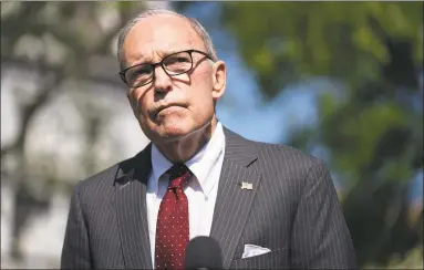  ?? Evan Vucci / Associated Press ?? White House chief economic adviser Larry Kudlow talks to reporters at the White House on April 6 in Washington.