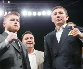  ?? The Associated Press ?? Saul "Canelo" Alvarez, left, and Gennady Golovkin pose in Las Vegas in this recent file photo. The much anticipate­d Sept. 16 middleweig­ht title fight between Golovkin and Alvarez will take place on the Las Vegas Strip.