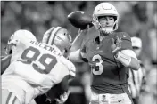  ?? ASSOCIATED PRESS ?? ARIZONA CARDINALS quarterbac­k Josh Rosen (3) throws as San Francisco 49ers defensive tackle DeForest Buckner (99) pursues during the second half of an NFL football game in Glendale.