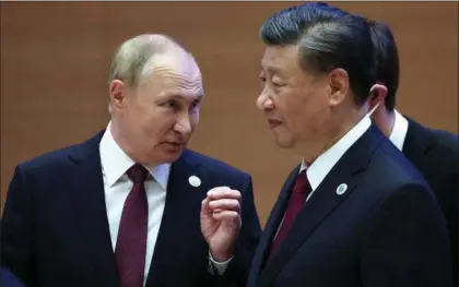  ?? ?? Xi Jinping og Vladimir Putin havde et langt møde ansigt til ansigt under SCOkonfere­ncen, hvor de cementered­e det taette venskab.
Foto: Sergei Bobulyov/AFP