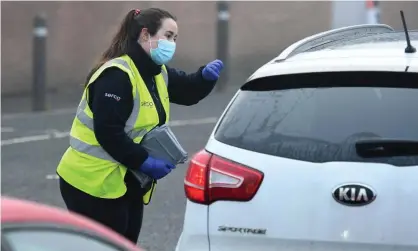  ?? Photograph: Oli Scarff/AFP/Getty Images ?? Serco runs a fifth of Covid-19 testing sites.