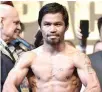  ?? ALVIN S. GO ?? FILIPINO boxing legend Manny Pacquiao will use part of the proceeds from his planned clash against mixed martial arts fighter Conor McGregor to help in the fight against the coronaviru­s pandemic here.