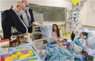  ?? (Mark Neyman/GPO) ?? PRESIDENT REUBEN RIVLIN visits Barzilai Medical Center in Ashkelon yesterday to check-up on those injured from Gazan rockets.