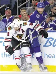  ?? BRUCE BENNETT / GETTY IMAGES ?? Blackhawks stalwart Duncan Keith (2) has helped keep Lightning star Steven Stamkos without a goal in the Stanley Cup Final.