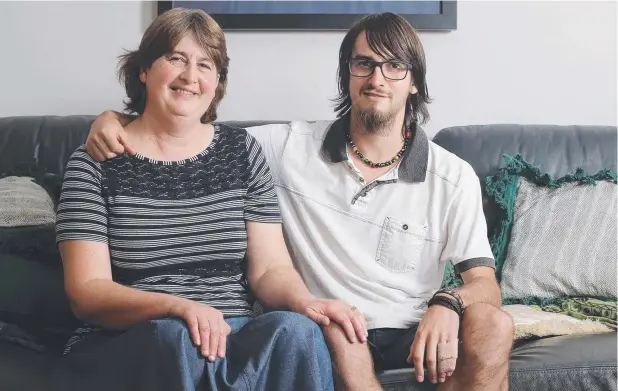  ??  ?? BETTER PREPARED: Elizabeth Gaskell with son Andrew Gaskell, who survived 13 days lost in the Borneo jungle in Malaysia. Picture: LUKE BOWDEN