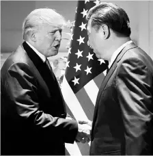  ??  ?? A file photo of US President Donald Trump ( left) with Chinese President Xi Jinping. Trump will be in China between November 8 and 10