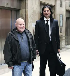  ?? COLIN PERKEL / THE CANADIAN PRESS ?? LeRoy St. Germaine, left, publisher of Toronto’s Your Ward News, and editor-in-chief James Sears were in court last month on charges of making death threats.