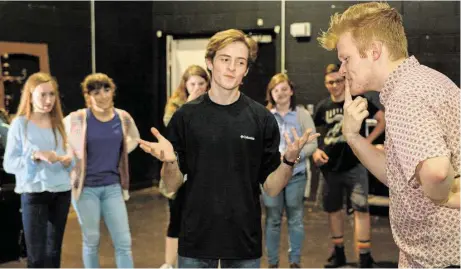  ?? Jerry Baker photos ?? The Woodlands High School Improv Troupe members Will Burke, left and Chance Bryant rehearse in the school’s black box theater.