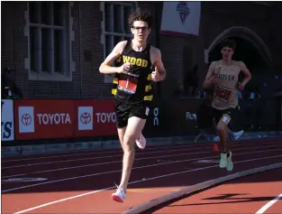  ?? MIKEY REEVES/FOR MEDIANEWS GROUP ?? Archbishop Wood senior Gary Martin runs at Penn Relays last month. Martin broke 4 minutes in the mile, the first Pennsylvan­ia high schooler ever to do so, at the Catholic League championsh­ips Saturday.