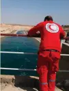  ??  ?? An Arab Red Crescent member at the Tabqa dam in Syria yesterday